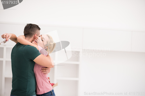 Image of happy Young couple moving in new house