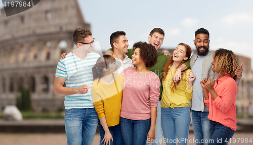 Image of international group of happy people over coliseum