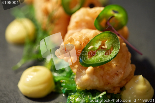 Image of close up of prawn salad with jalapeno and wakame