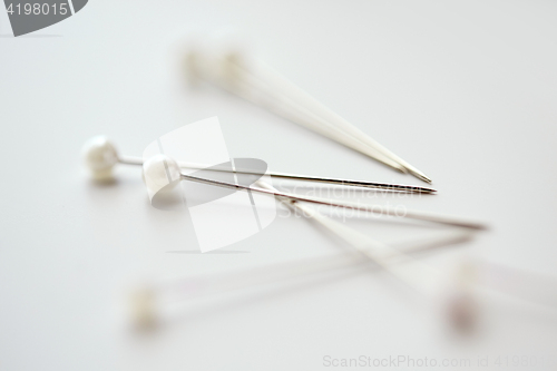 Image of many sewing pins