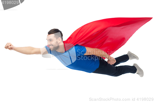 Image of happy man in red superhero cape flying on air