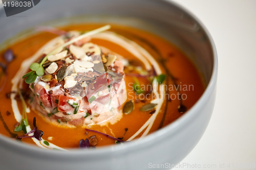 Image of close up of vegetable pumpkin-ginger soup in bowl