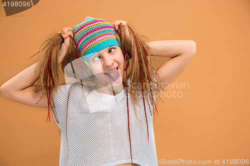 Image of The face of playful happy teen girl