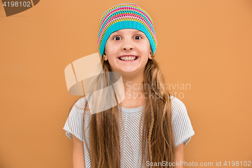 Image of The face of playful happy teen girl