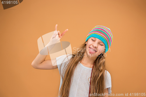 Image of The face of playful happy teen girl