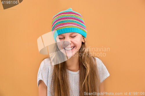 Image of The face of playful happy teen girl