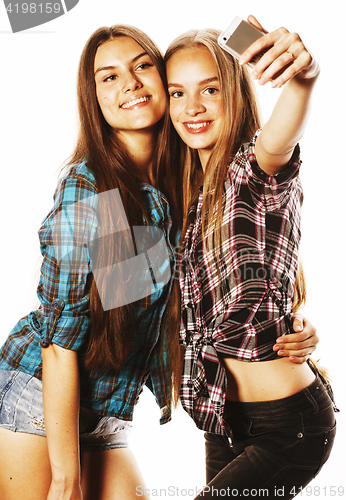 Image of cute teenage girls making selfie isolated