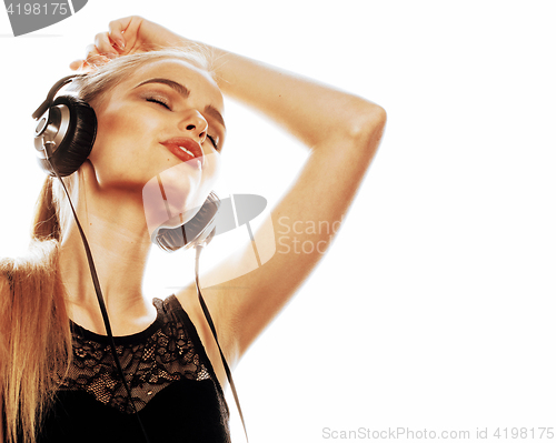 Image of young sweet talented teenage girl in headphones singing isolated