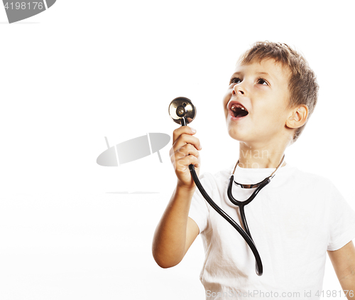 Image of little cute boy with stethoscope playing like adult profession d