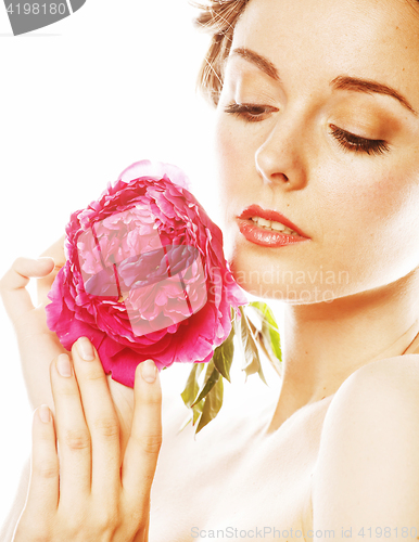 Image of young beauty woman with flower peony pink closeup makeup soft te