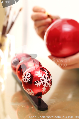 Image of Decorating baubles, handmade