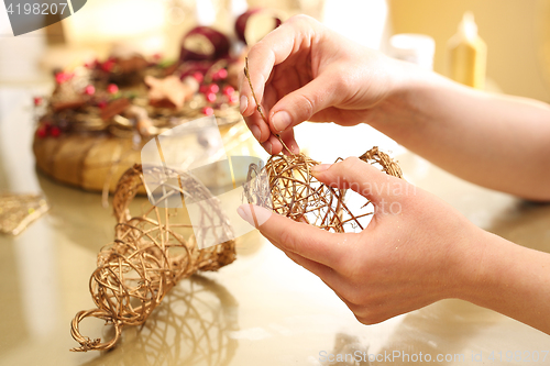 Image of Christmas tree toy bells braided sticks 