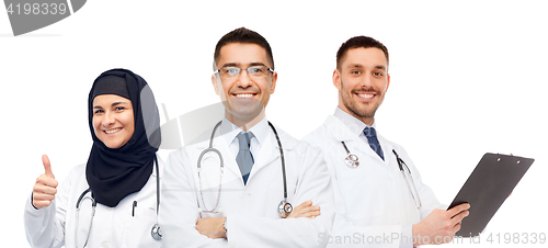 Image of happy doctors with stethoscopes showing thumbs up