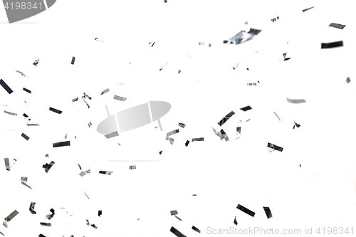 Image of silver confetti over white background