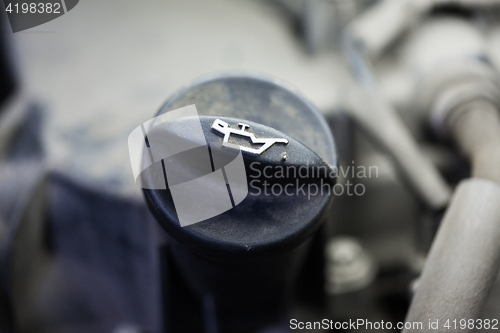 Image of motor oil tank cap in car