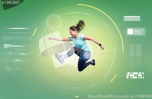 Image of happy smiling sporty young woman jumping in air