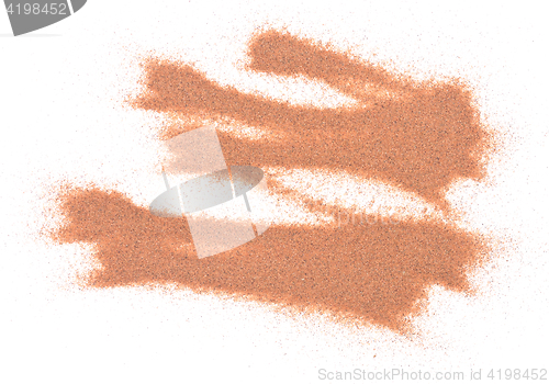 Image of pile of red sand