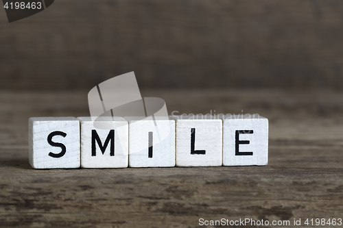 Image of Smile, written in cubes    