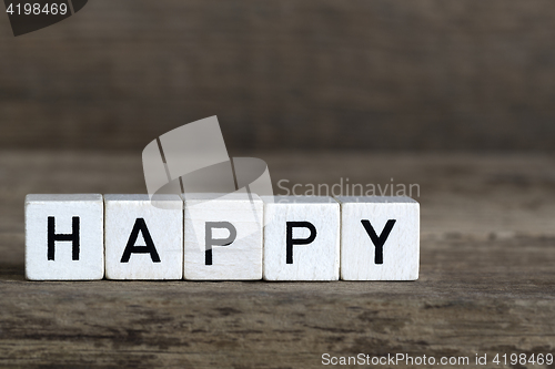 Image of Happy, written in cubes    