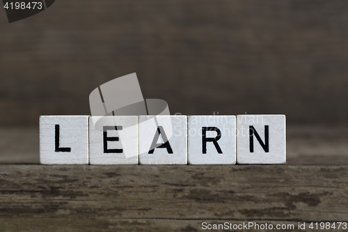 Image of Learn, written in cubes    