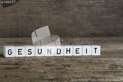 Image of German word health, written in cubes