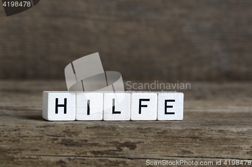Image of German word help, written in cubes