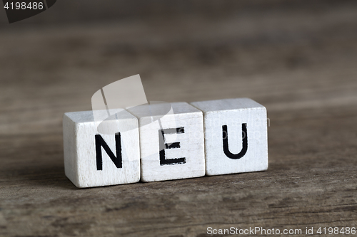 Image of German word new, written in cubes