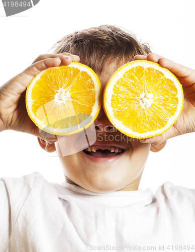 Image of little cute boy with orange fruit double isolated on white smili