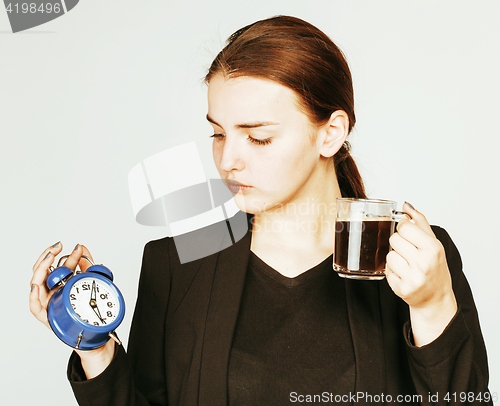 Image of young beauty woman in business style costume waking up for work 