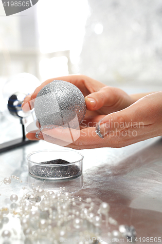 Image of Christmas decorations factory, the position of decorating glass ornaments