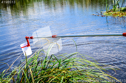 Image of Take samples of water for laboratory testing.