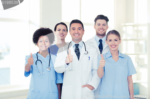 Image of group of happy doctors at hospital