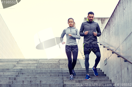 Image of couple walking downstairs on stadium