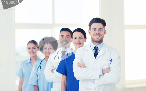 Image of group of happy doctors at hospital