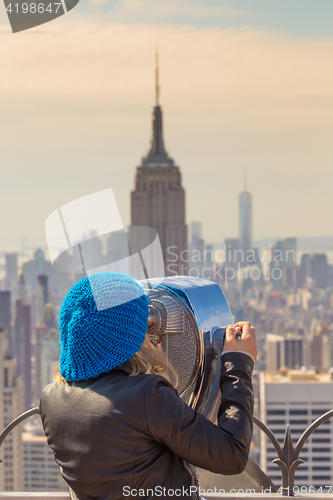 Image of Woman enjoying in New York City panoramic view.