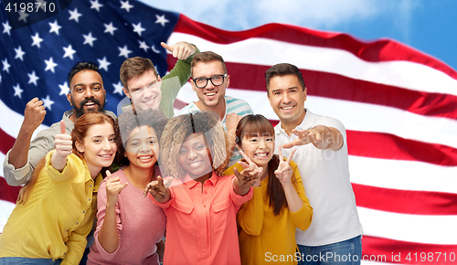 Image of international people gesturing over american flag