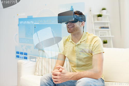 Image of young man in virtual reality headset or 3d glasses