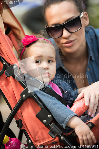 Image of mother and baby in the park