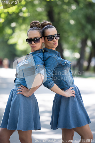 Image of twin sister with sunglasses