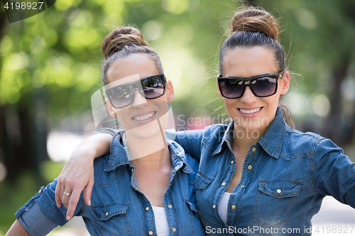 Image of twin sister with sunglasses