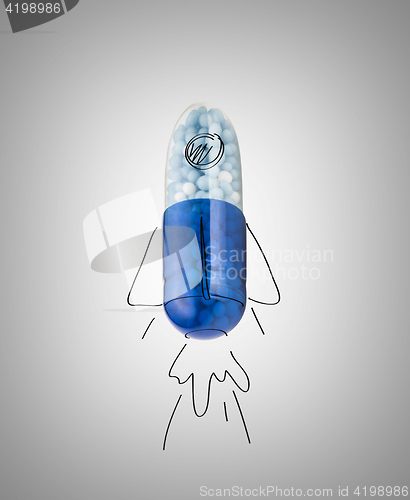 Image of Blue capsules and pills background