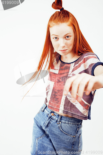 Image of young pretty red head teenage hipster girl posing emotional happy smiling on white background, lifestyle people concept 
