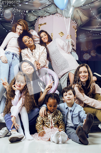 Image of Lifestyle and people concept: young pretty diversity nations woman with different age children celebrating on birth day party together happy smiling, making selfie. African-american, asian and caucasi