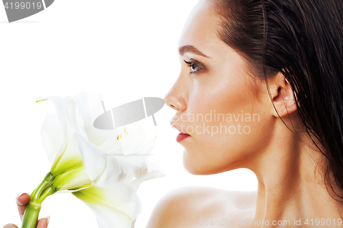 Image of young pretty woman with  Amarilis flower close up isolated on wh