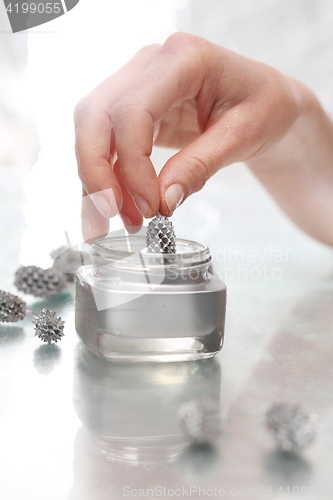 Image of Painting glass balls Christmas decorations.