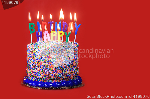 Image of Birthday Celebration Candles on Red Background