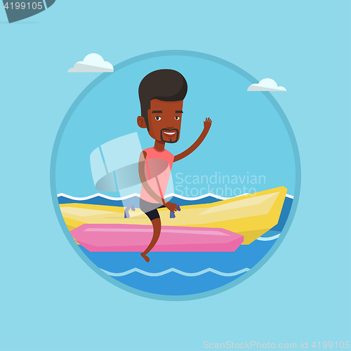 Image of Tourists riding a banana boat vector illustration.