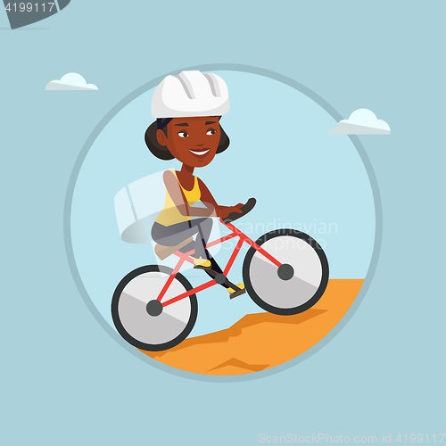 Image of Young woman on bicycle traveling in the mountains.