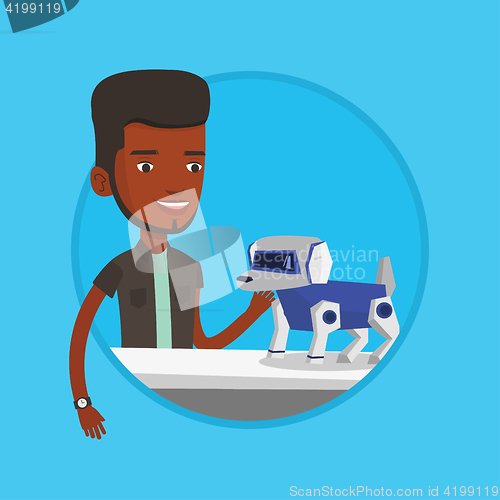 Image of Happy young man playing with robotic dog.