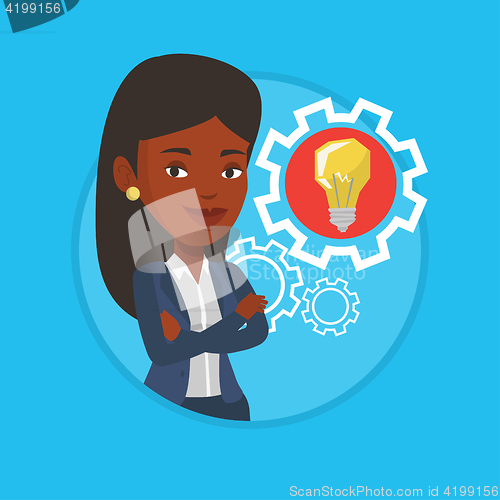 Image of Woman with business idea bulb in gear.